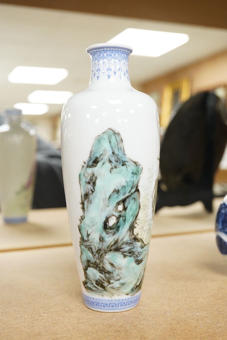 A Chinese famille rose figural vase, 17cm high